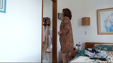 Great compilation of a stepmother on the beach putting on a bikini, showing off her big pussy.